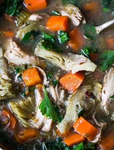 Instant Pot Chicken Artichoke Soup with Wild Rice - a light, healthy and brothy soup with vegetables, wild rice and artichoke hearts with only 15 minutes of hands on time! A quick and easy dinner recipe! Keto friendly! #chickensoup #chickenwildricesoup #instantpotrecipe #instantpotsouprecipe #brothbasedsoup #artichokesoup #easysoup #easydinner #ketosoup