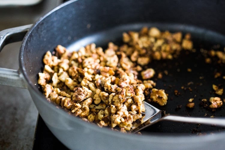 A delicious recipe for Fesenjan, a Persian Walnut Pomegranate Stew with chicken and chickpeas. Earthy, rich and tangy, this is bursting with Middle Eastern Flavor! #persianstew #fesenjan #persianrecipes #persiancchicken #middleeastern #chicken #chickpeastew 