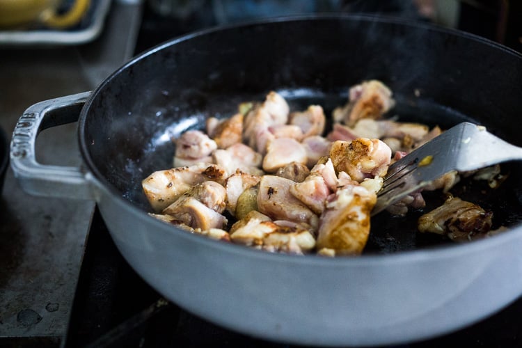 A delicious recipe for Fesenjan, a Persian Walnut Pomegranate Stew with chicken and chickpeas. Earthy, rich and tangy, this is bursting with Middle Eastern Flavor! #persianstew #fesenjan #persianrecipes #persiancchicken #middleeastern #chicken #chickpeastew 