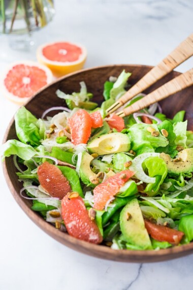 Grapefruit Fennel and Avocado Salad with Pistachios and a Citrus Shallot Dressing. A simple easy salad that is healthy, vegan and delicious! #grapefruitsalad #vegansalad #fennelsalad #avocadosalad #eatingclean #healthysalads