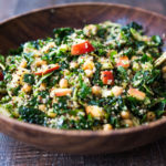 Winter Happiness Salad! Kale Quinoa Salad with Apples, Chickpeas and Currants! A hearty vegan salad that can be made ahead- perfect for potlucks, gatherings or midweek lunches! #kalesalad #vegansalad #quinoasalad #chickpeasalad #healthysalad #potluck