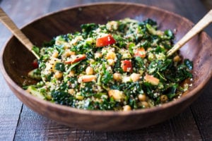 Winter Happiness Salad! Kale Quinoa Salad with Apples, Chickpeas and Currants! A hearty vegan salad that can be made ahead- perfect for potlucks, gatherings or midweek lunches! #kalesalad #vegansalad #quinoasalad #chickpeasalad #healthysalad #potluck
