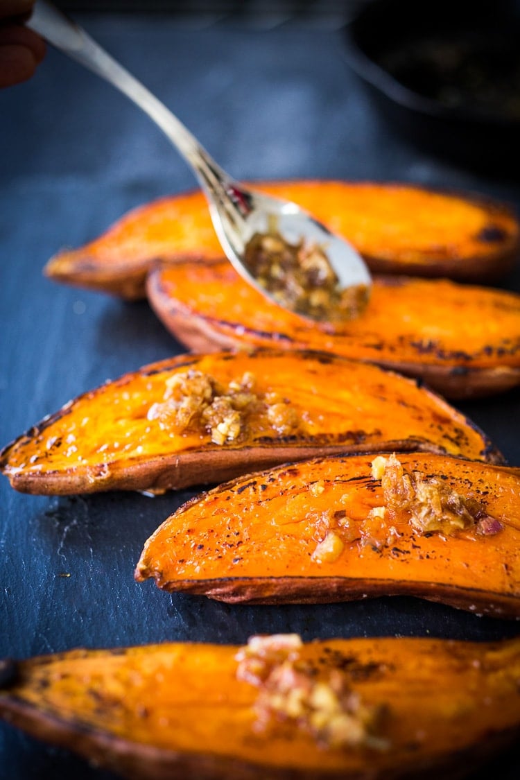 Kyoto Roasted Sweet Potatoes with Miso, Ginger and Scallions - an easy vegan side that is healthy and full of amazing flavor! #sweetpotatoes #yams #veganside #miso#roastedsweetpotatoes #vegan #cleaneating #plantbased #veganside 