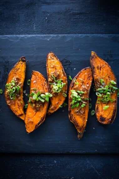 Kyoto Roasted Sweet Potatoes with Miso, Ginger and Scallions - an easy vegan side that is healthy and full of amazing flavor! #sweetpotatoes #yams #veganside #miso#roastedsweetpotatoes #vegan #cleaneating #plantbased #veganside