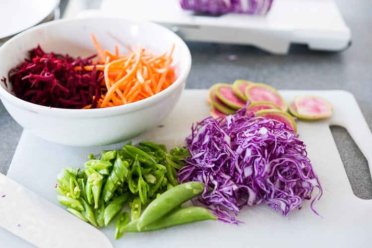 Bali Bowl with Peanut Tofu, black rice, roasted sweet potatoes, shredded cabbage, radish and snow peas. #peanutsauce #peanuttofu #healthybowl #veganbowls #buddhabowls #vegan #plantbased #cleaneating #eatclean #detoxrecipes #balifood #balinese