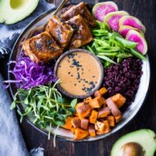 Bali Bowl with Peanut Tofu, black rice, roasted sweet potatoes, shredded cabbage, radish and snow peas. #peanutsauce #peanuttofu #healthybowl #veganbowls #buddhabowls #vegan #plantbased #cleaneating #eatclean #detoxrecipes #balifood #balinese