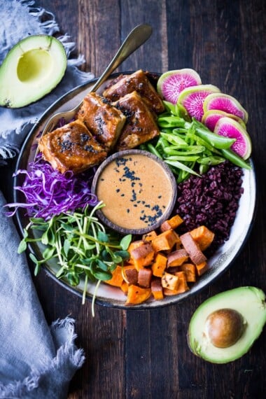 Bali Bowl with Peanut Tofu, black rice, roasted sweet potatoes, shredded cabbage, radish and snow peas. #peanutsauce #peanuttofu #healthybowl #veganbowls #buddhabowls #vegan #plantbased #cleaneating #eatclean #detoxrecipes #balifood #balinese