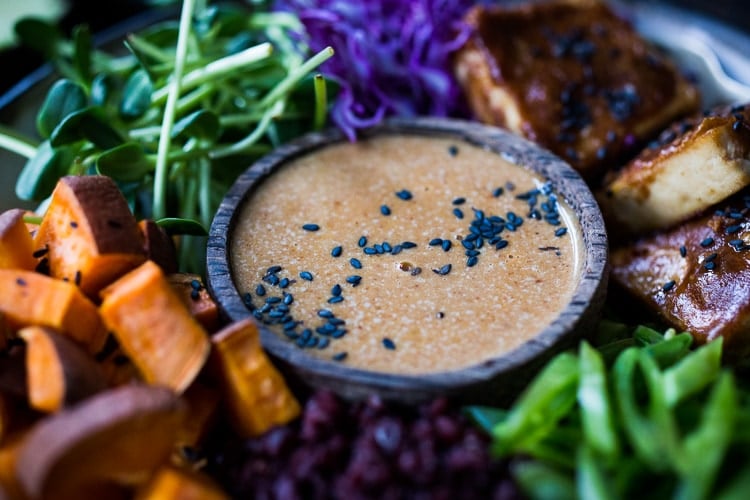 Bali Bowl with Peanut Tofu, black rice, roasted sweet potatoes, shredded cabbage, radish and snow peas. #peanutsauce #peanuttofu #healthybowl #veganbowls #buddhabowls #vegan #plantbased #cleaneating #eatclean #detoxrecipes #balifood #balinese