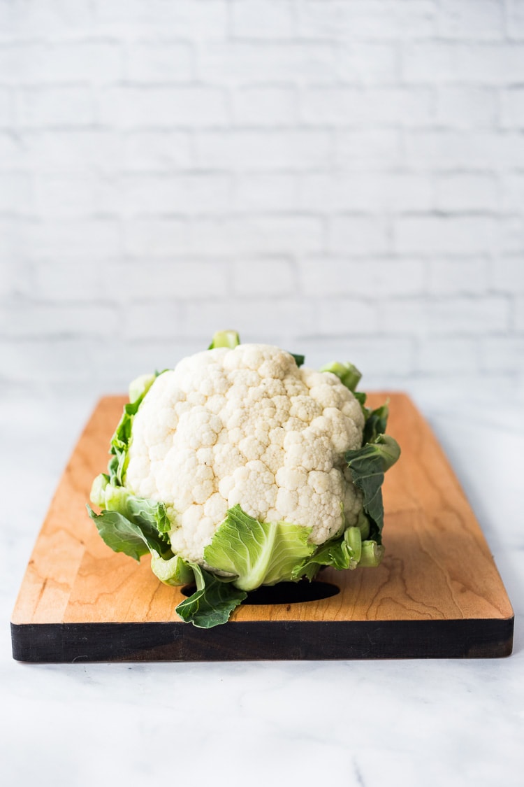 How to make cauliflower rice! A healthy, low-carb alternative to rice, that is easy to make and tastes amazing! #cauliflowerrice #howtomakecauliflowerrice #cauliflower #lowcarb #keto #rice #ricedcauliflower #vegan #eatclean #cleaneatingrecipes 