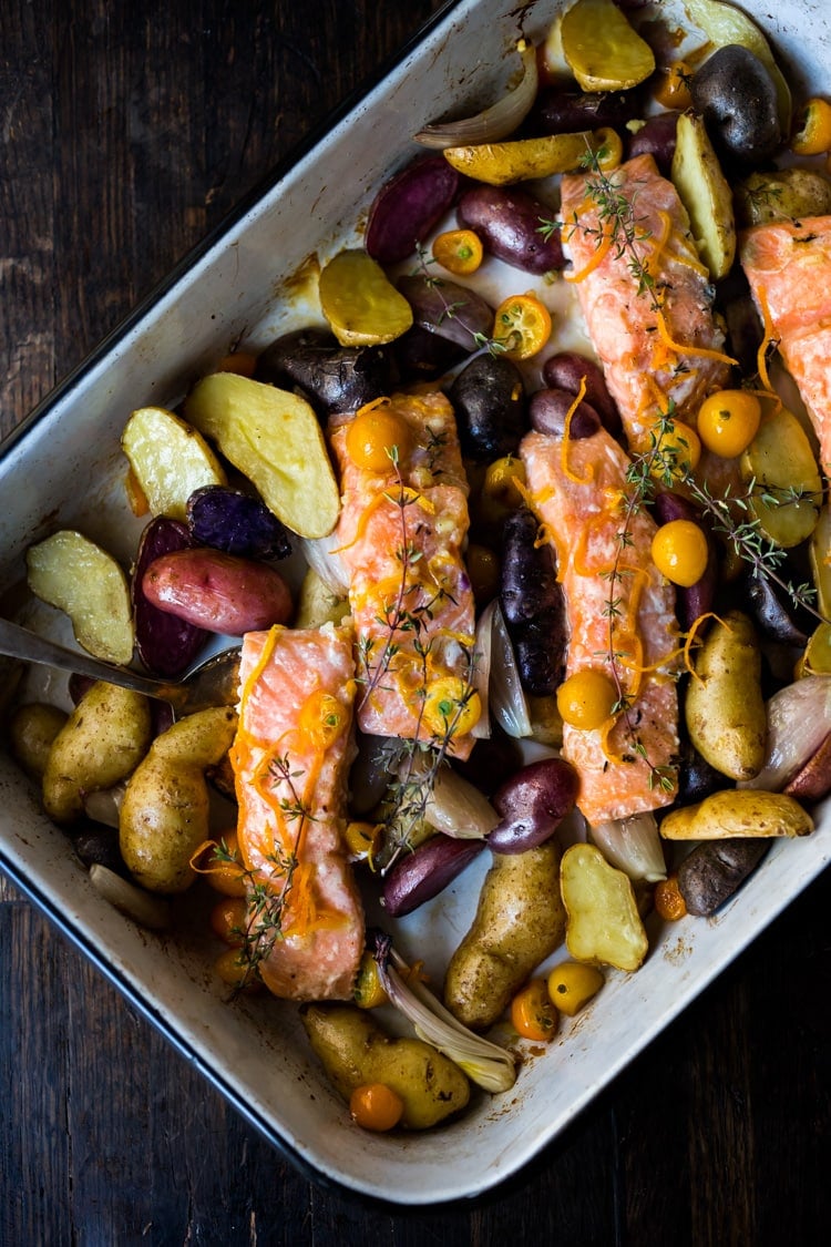 Citrus Baked Salmon with roasted fingerling potatoes in a flavorful citrus marinade. With only 15 minutes of hands-on time, this simple easy sheet-pan diner recipe is perfect for busy weeknights! Healthy and Light! Serve it up with the Everyday Kale Salad! 