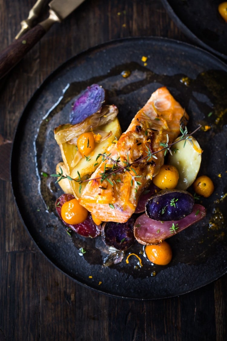 Citrus Baked Salmon with roasted fingerling potatoes in a flavorful citrus marinade. With only 15 minutes of hands-on time, this simple easy sheet-pan diner recipe is perfect for busy weeknights! Healthy and Light! Serve it up with the Everyday Kale Salad! 