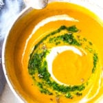 Carrot Soup with Chermoula and North African Spices - a simple healthy soup bursting with flavor. Vegan Adaptable! #carrotsoup #carrots #vegan #chermoula