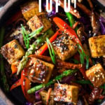 Szechuan Tofu and Veggie Stir Fry! A flavorful vegan stir-fry with crispy tofu, szechuan sauce and loaded up with healthy vegetables! Quick, easy and flavorful!!! #vegan #szechuan #szechwan #szechuansauce #tofu #stirfry #stir-fry