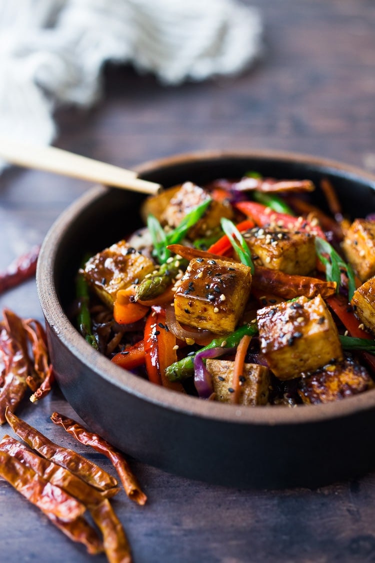 Szechuan Tofu and Veggies! A flavorful vegan stir-fry with crispy tofu, szechuan sauce and loaded up with healthy vegetables! Quick, easy and flavorful!!! #vegan #szechuan #szechwan #szechuansauce #tofu #stirfry #stir-fry 