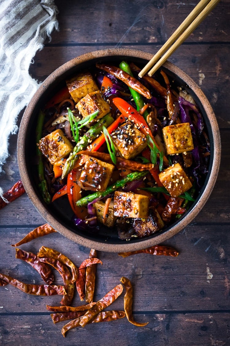 Szechuan Tofu and Veggies! A flavorful vegan stir-fry with crispy tofu, szechuan sauce and loaded up with healthy vegetables! Quick, easy and flavorful!!! #vegan #szechuan #szechwan #szechuansauce #tofu #stirfry #stir-fry 