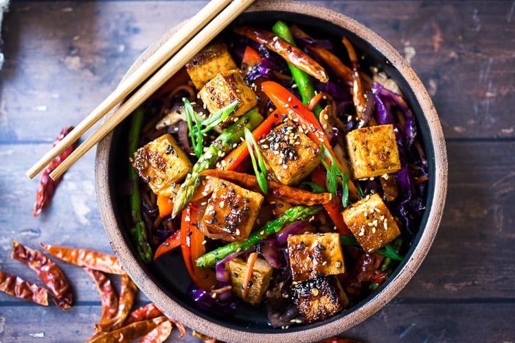 Szechuan Tofu and Veggies! A flavorful vegan stir-fry with crispy tofu, szechuan sauce and loaded up with healthy vegetables! Quick, easy and flavorful!!! #vegan #szechuan #szechwan #szechuansauce #tofu #stirfry #stir-fry