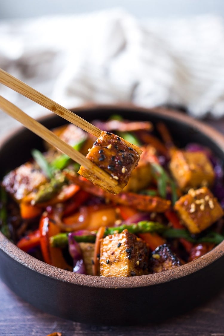 Szechuan Tofu and Veggies! A flavorful vegan stir-fry with crispy tofu, szechuan sauce and loaded up with healthy vegetables! Quick, easy and flavorful!!! #vegan #szechuan #szechwan #szechuansauce #tofu #stirfry #stir-fry