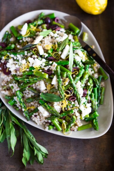 Spring Asparagus Salad with Israeli Cous Cous ( or use a grain!) kalamata olives, feta, lemon zest and mint with a lemony dressing. #asparagus #asparagussalad