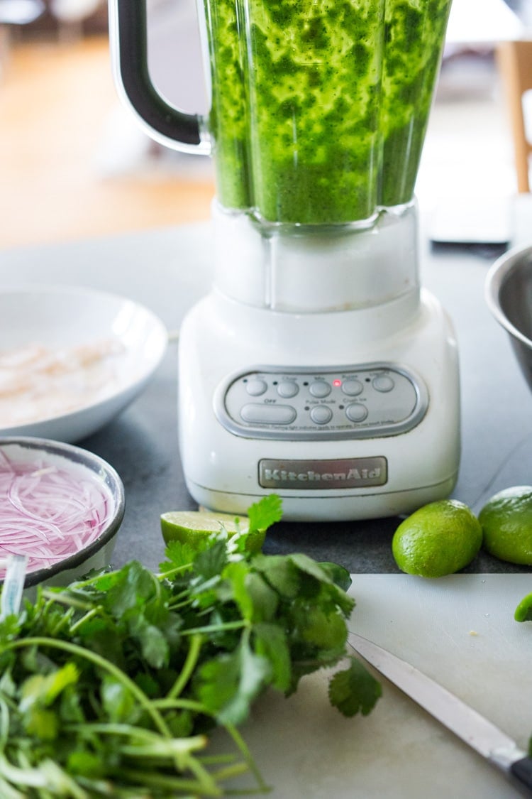 Authentic Aguachile Recipe! Similar to ceviche, shrimp is cooked in a mixture of lime juice, chiles and cilantro. Flavorful, simple and sooooo delicious! #aguachile #shrimp #verde #ceviche #Mexican