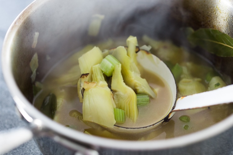 Artichoke Soup! A simple delicious recipe using fresh or frozen artichoke hearts that can be made vegan or made creamy! Keto friendly! #feastingathome #artichokes #artichoke #artichokesoup #vegan #keto 