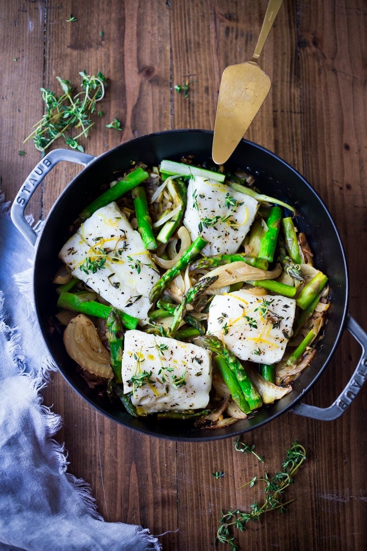 Baked Cod with Asparagus, Fennel and Leeks - a simple, spring-inspired dinner! #bakedcod #cod #codrecipes #recipes #fish #bakedfish #springrecipes #ketorecipes #lowcarb 