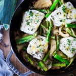 Baked Cod with Asparagus, Fennel and Leeks - a simple, spring-inspired dinner! #bakedcod #cod #codrecipes #recipes #fish #bakedfish #springrecipes #ketorecipes #lowcarb