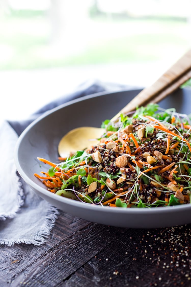 Carrot Quinoa Salad with Almonds and Raw Apple Cider Vinaigrette- a delicious vegan salad that can be made ahead. #vegan #quinoa #quinoasalad #carrotsalad #vegansalad