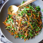 Carrot Quinoa Salad with Almonds and Raw Apple Cider Vinaigrette- a delicious vegan salad that can be made ahead. #vegan #quinoa #quinoasalad #carrotsalad #vegansalad