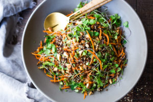 Carrot Quinoa Salad with Almonds and Raw Apple Cider Vinaigrette- a delicious vegan salad that can be made ahead. #vegan #quinoa #quinoasalad #carrotsalad #vegansalad