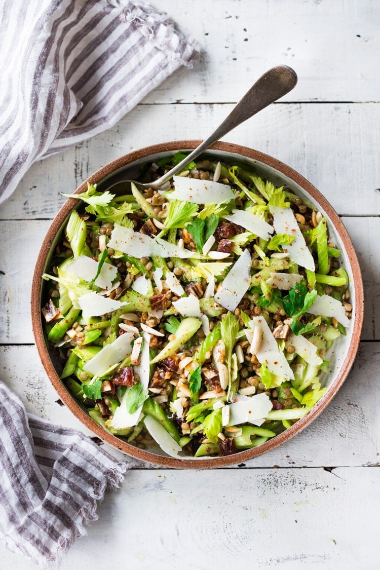 Celery Salad with lentils, dates and almonds - a delicious make ahead salad that keeps for several days in the fridge. Keep it vegan or add shaved pecorino! #celerysalad #lentilsalad #healthysalad #salad #vegansalad