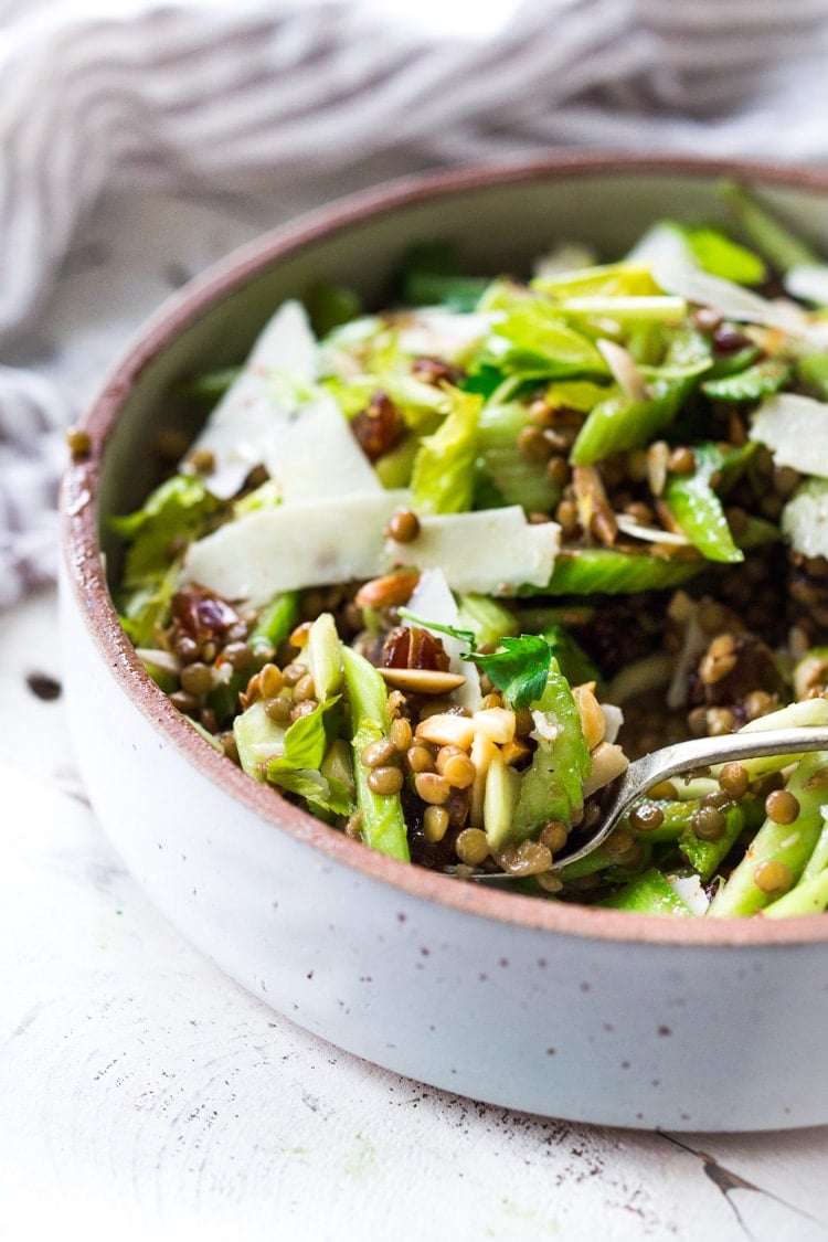 Celery Salad with lentils, dates and almonds - a delicious make ahead salad that keeps for several days in the fridge. Keep it vegan or add shaved pecorino! #celerysalad #lentilsalad #healthysalad #salad #vegansalad