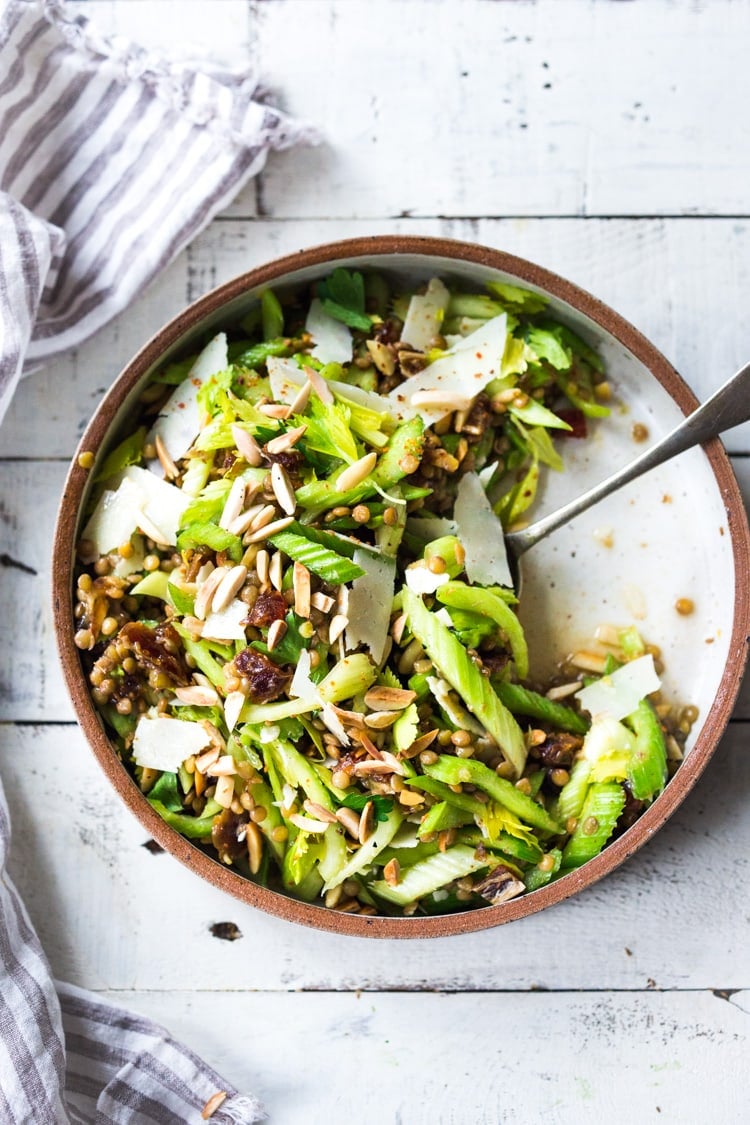 Celery Salad with lentils, dates and almonds - a delicious make ahead salad that keeps for several days in the fridge. Keep it vegan or add shaved pecorino! #celerysalad #lentilsalad #healthysalad #salad #vegansalad