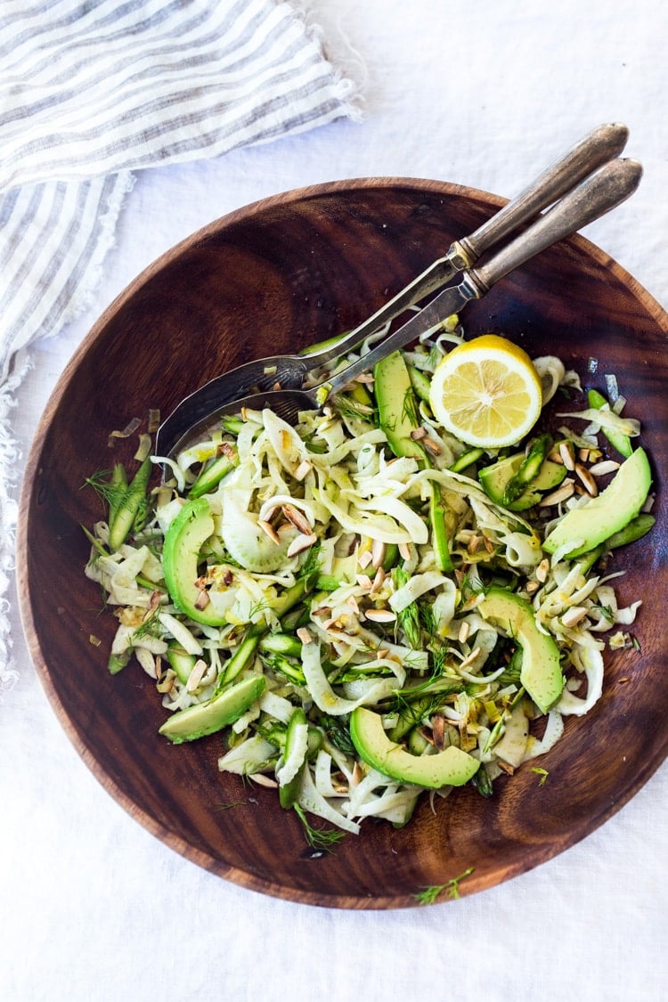 Asparagus Salad with Almonds Fennel and Lemony Leek Dressing. This vegan salad can be made ahead, a perfect side to fish, chicken or tofu. #fennel #fennelsalad #asparagus #vegansalad #eatclean #leeks #recipe #slaw #vegan #plantbased
