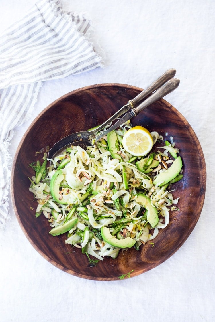 Fennel Asparagus Salad with Almonds and Lemony Leek Dressing. This vegan salad can be made ahead, a perfect side to fish, chicken or tofu. #fennel #fennelsalad #asparagus #vegansalad #eatclean #leeks #recipe #slaw #vegan #plantbased