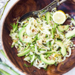 Fennel Asparagus Salad with Almonds and Lemony Leek Dressing. This vegan salad can be made ahead, a perfect side to fish, chicken or tofu. #fennel #fennelsalad #asparagus #vegansalad #eatclean #leeks #recipe #slaw #vegan #plantbased