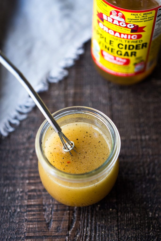 A simple recipe for Raw Apple Cider Vinaigrette, an easy “Every day” salad dressing full of healthy probiotics. Make with your choice of honey or maple!