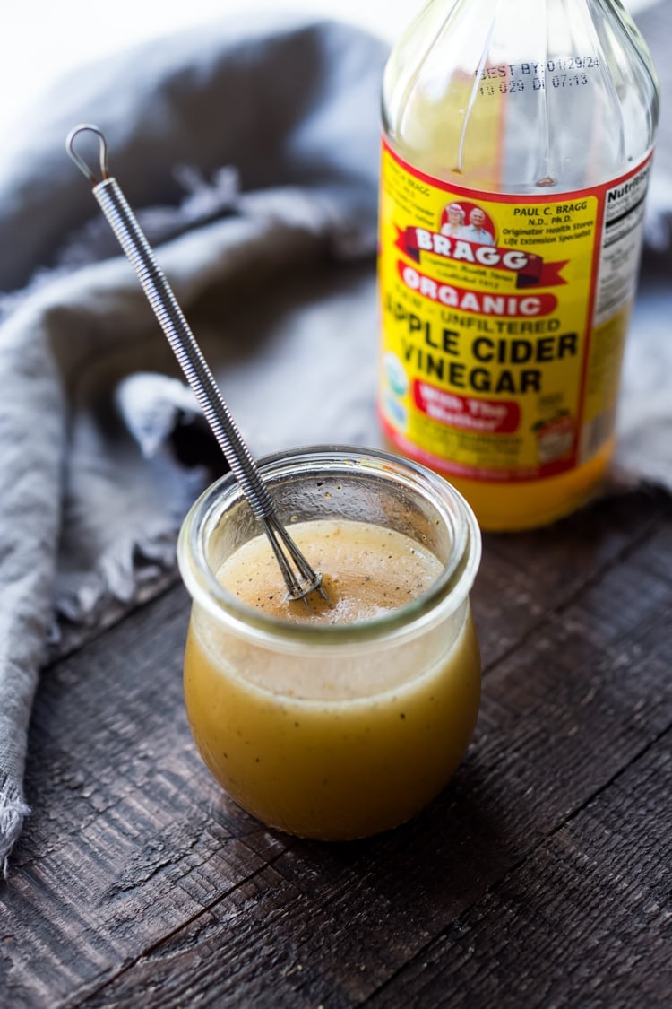 Homemade Apple Cider Vinaigrette in a jar.