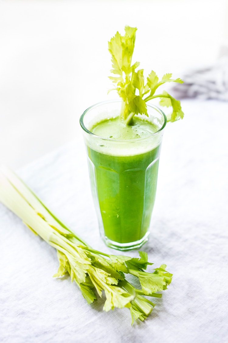 Celery juice in a tall glass.