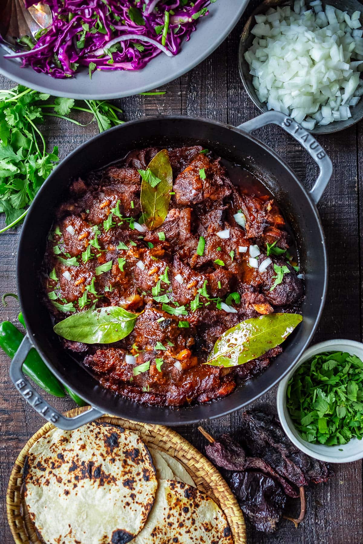 This simple, delicious Barbacoa recipe hails from the Oaxacan region of Mexico, resulting in the most flavorful,  tender, fall-off-the-bone meat. Slow roast it in your oven or use a slow cooker. Perfect in tacos or burritos. 