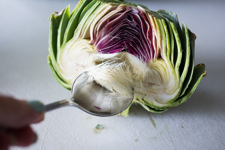 How to roast Artichokes! Roasted Artichokes with Lemony Leek dressing - a healthy vegan way to cook and serve our favorite spring vegetable! #artichoke #artichokes #bakedartichokes #roastedartichokes #vegan #veganartichokesauce 