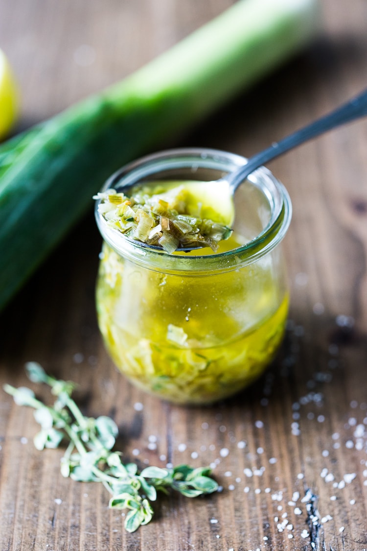 How to roast Artichokes! Roasted Artichokes with Lemony Leek dressing - a healthy vegan way to cook and serve our favorite spring vegetable! #artichoke #artichokes #bakedartichokes #roastedartichokes #vegan #veganartichokesauce 