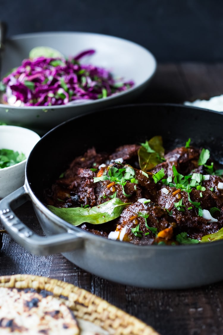 Mexican Lamb Barbacoa - a simple delicious recipe from Oaxaca that results in tender, juicy falling off the bone lamb perfect for tacos and burritos! #tacos #barbacoa #lamb #lambrecipes #oaxaca #mexicanrecipes #cincodemayo 
