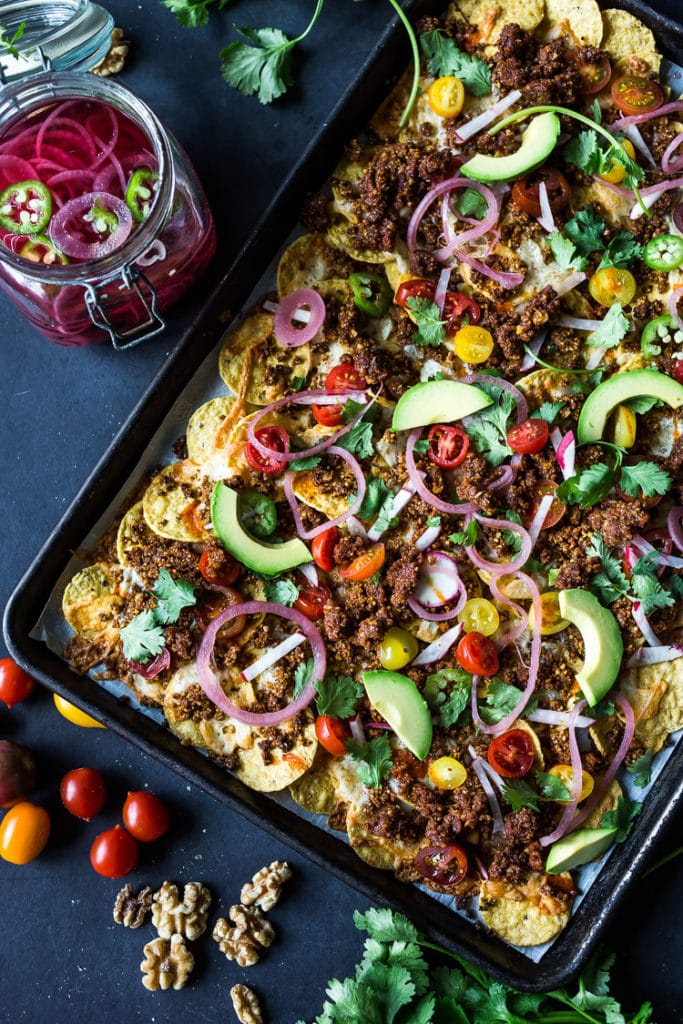 https://www.feastingathome.com/wp-content/uploads/2019/05/Nachos-Recipe-100-2-1-683x1024.jpg