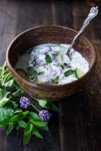 A delicious Raita Recipe- an Indian yogurt sauce with cucumber, mint and cilantro. Cooling and refreshing, serve this with spicy Indian dishes to cool the palate. #raita #yogurtsauce #cucumberraita #indianrecipes