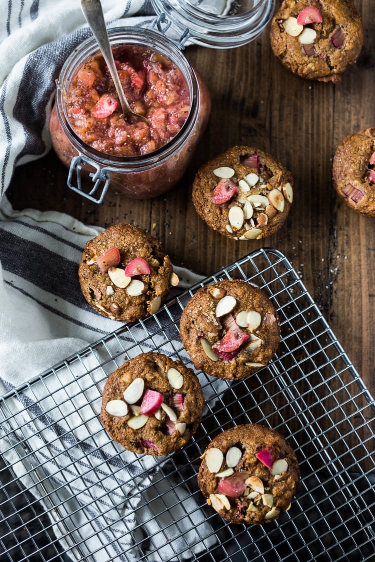 Rhubarb Muffins- a simple healthy one-bowl muffin recipe made with oats, your choice of flour, optional seeds and nuts, sweetened with maple syrup. Vegan and GF adaptable!  #rhubarb #rhubarbmuffins #rubbarbrecipes #muffins #spelt #chia #almonds