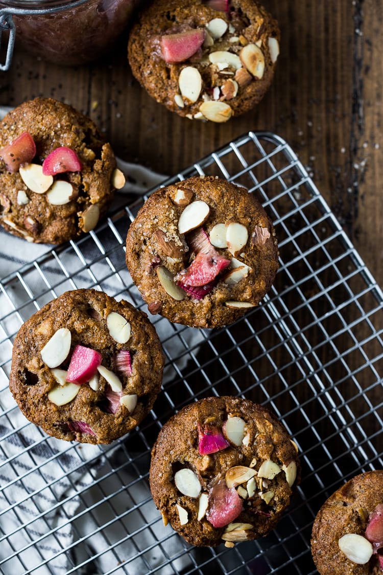 Delicious, whole-grain, Rhubarb Muffins with lemon, cardamom and vanilla,  sweetened with maple syrup. An easy, one-bowl recipe that is vegan adaptable and can be made GF. 