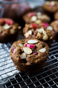 Delicious, whole-grain Rhubarb Muffins with lemon, cardamom, and vanilla, sweetened with maple syrup. Easy, healthy one-bowl recipe!