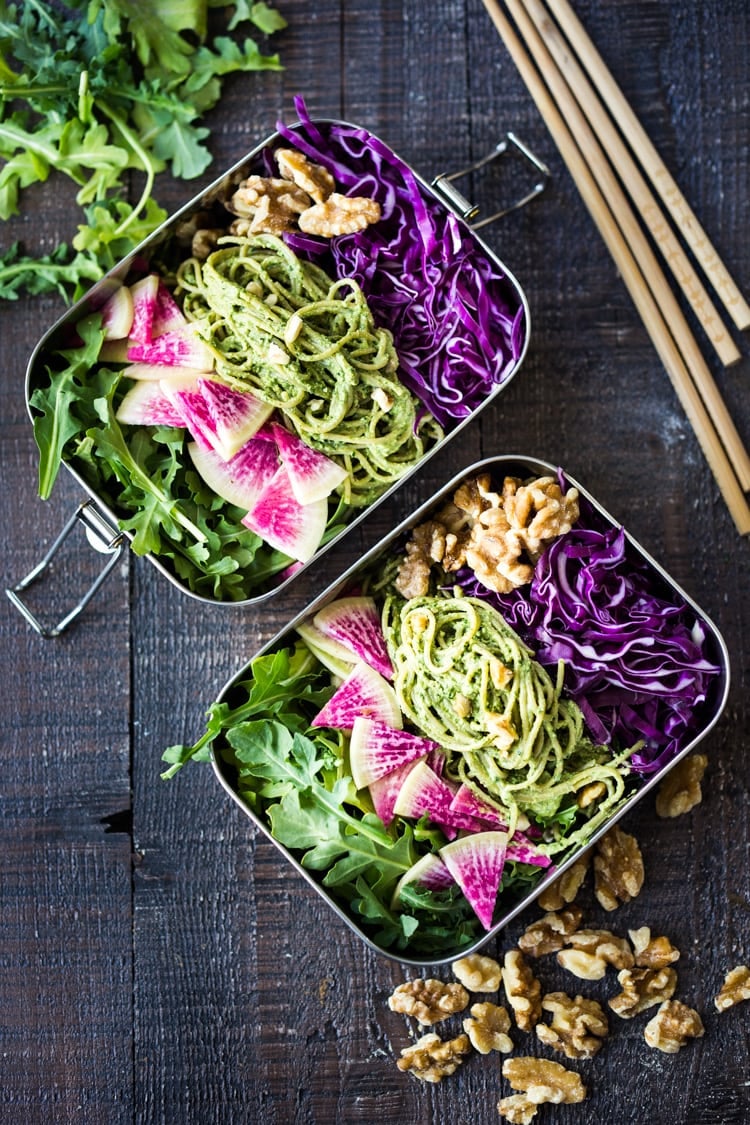 A delicious recipe for Superfood Walnut Pesto, tossed with soba noodles & loaded up with healthy veggies- a flavorful nutritious lunch that is packable and can be made ahead! Vegan and GF adaptable! #walnuts #walnutpesto #lunchbox #superfoods #pesto #soba #bentobox #bento #kalepesto #healthylunch #vegan #veganlunch #eatclean #cleaneating 