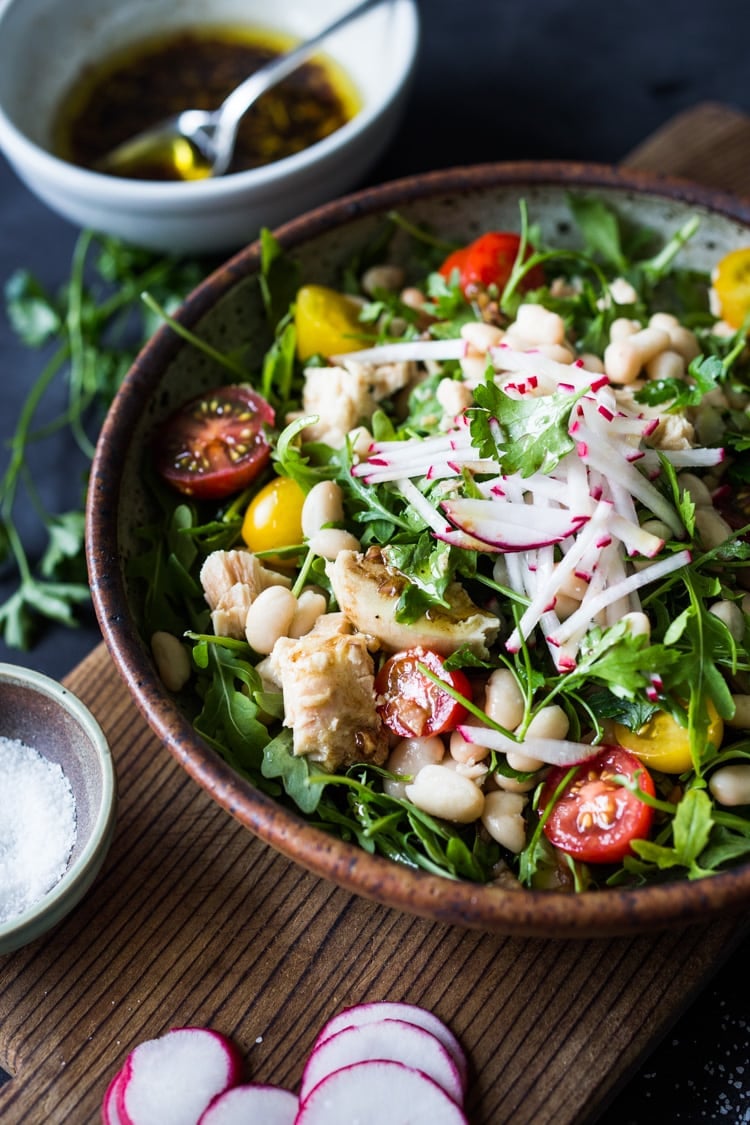 Tuscan Tuna Salad with arugula, white beans, radishes, tomatoes and a simple vinaigrette. Fast and easy, make this in 15 minutes!