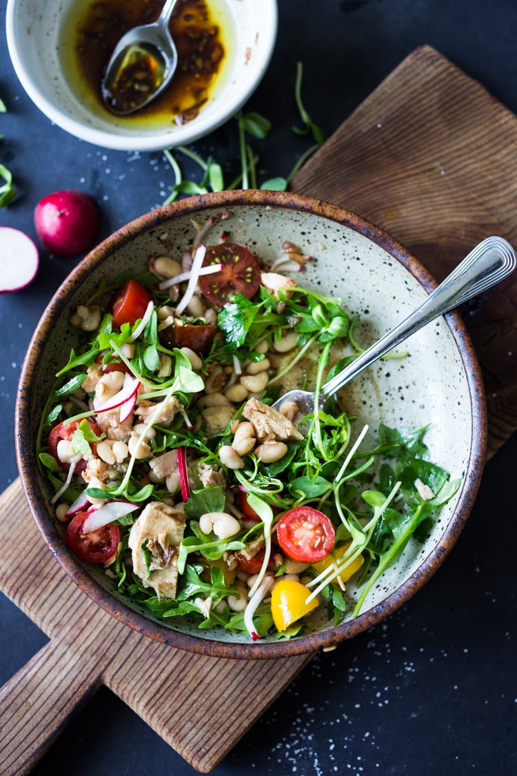 Tuscan Tuna Salad with arugula, white beans, radishes, tomatoes and a simple vinaigrette. Fast and easy, make this in 15 minutes!